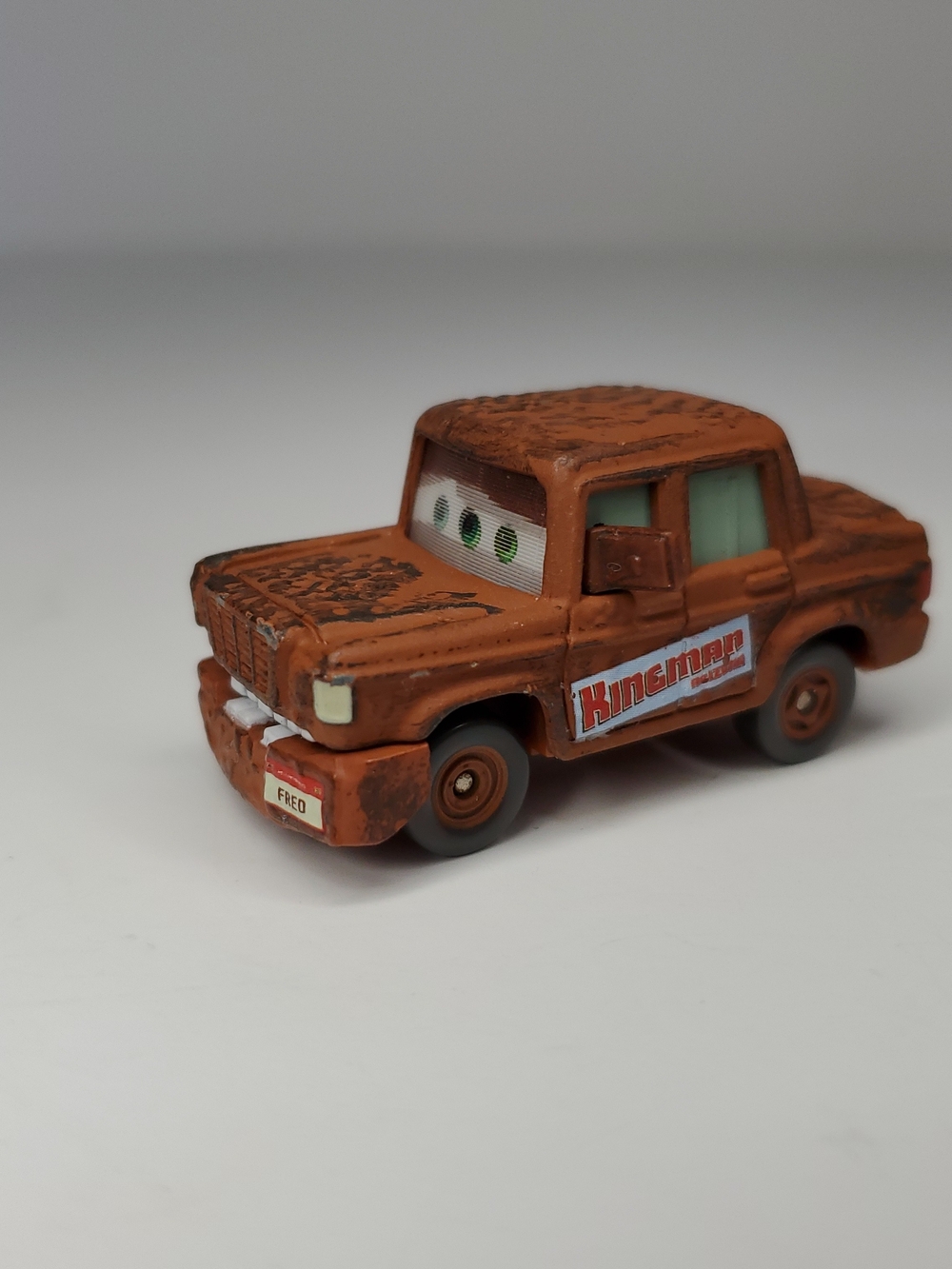 Disney Pixar Cars Fred The Rusty Car 2" Diecast Rust-eze Lenticular Eyes